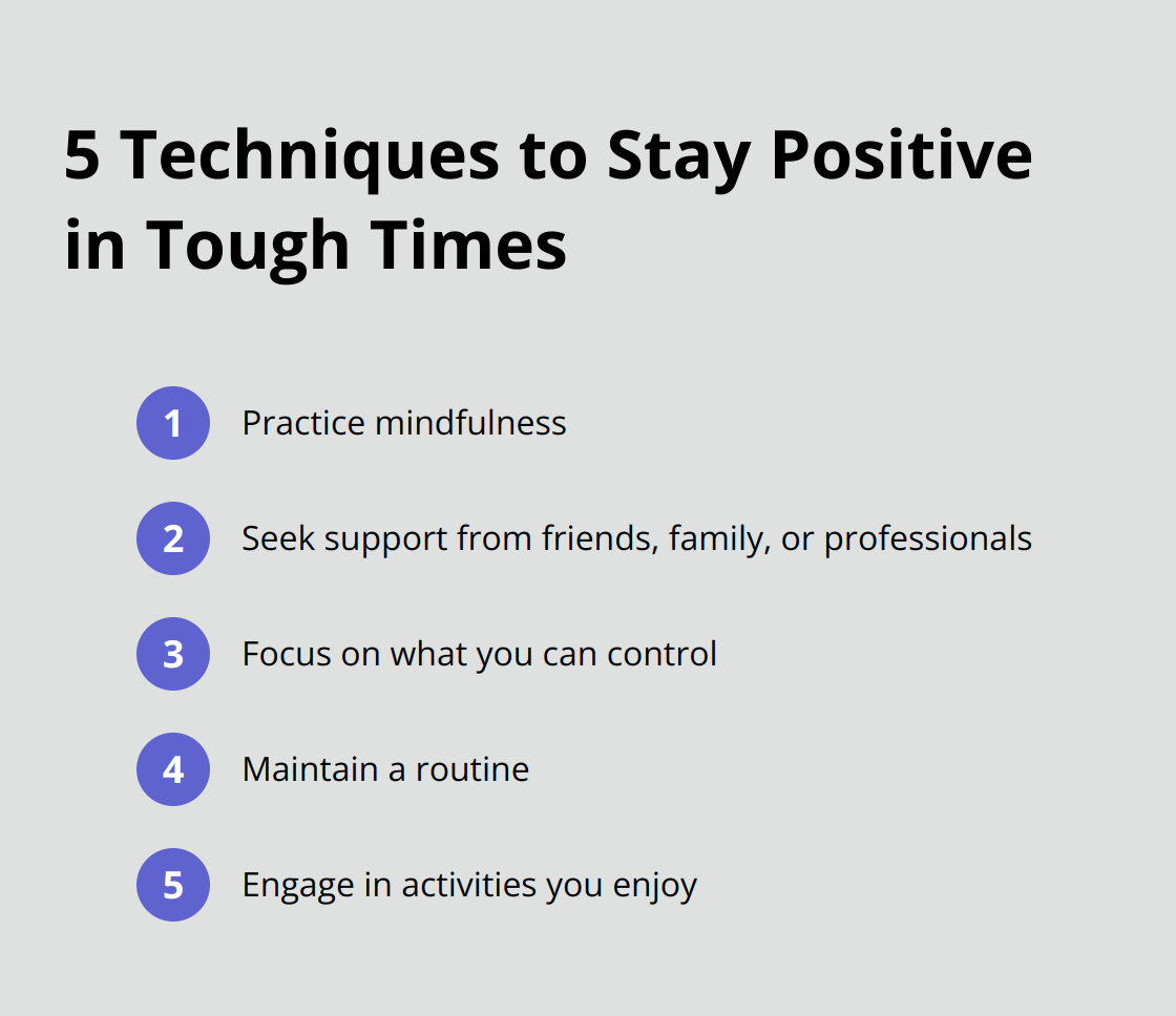 Ordered list of five techniques to stay positive during challenging times: practice mindfulness, seek support, focus on what you can control, maintain a routine, and engage in enjoyable activities - positive mind positive vibes